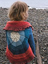 http://www.ravelry.com/patterns/library/pinwheel-sweater-child