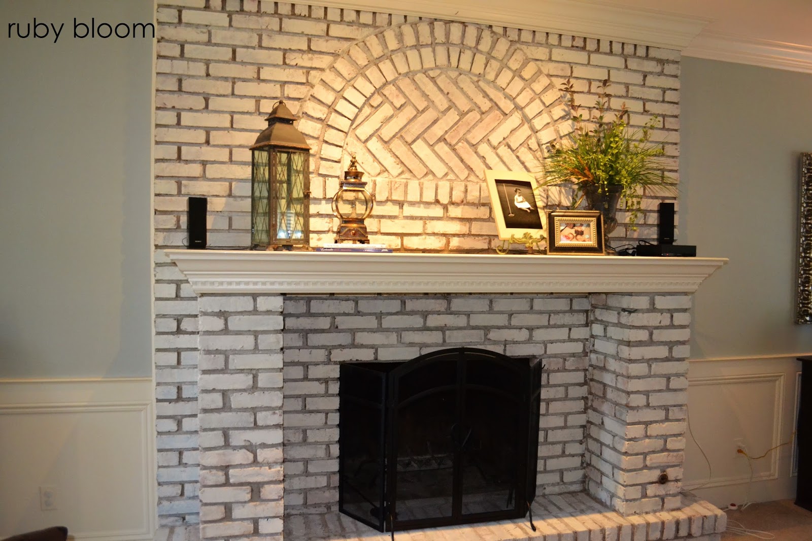 ruby bloom: Painted brick fireplace