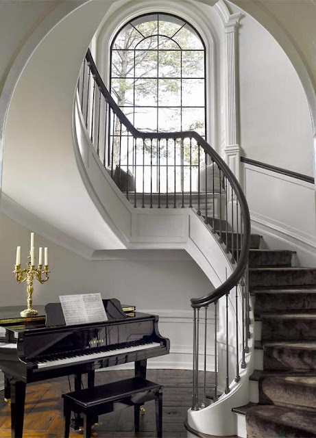 traditional large foyer with piano