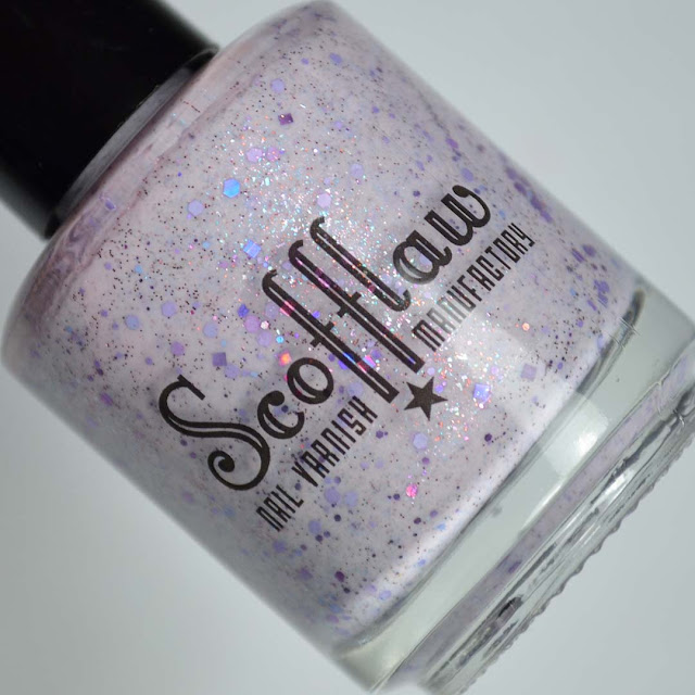 purple nail polish with purple holographic glitter