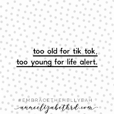 "Life is Short" in black print letters on a grey polka dot background