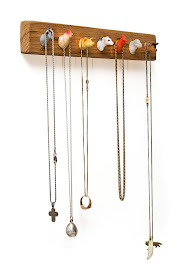 necklace rack with barnyard animal heads as pegs