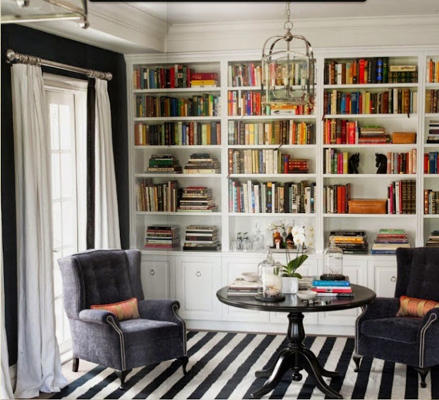 built in bookcases styling striped rug