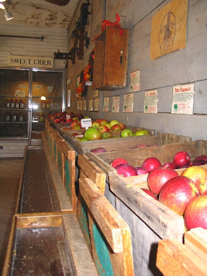 Wooden bins of apples