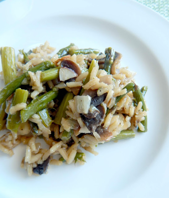 Mushroom & Asparagus Rice Pilaf....a simple, 20 minute side dish full of beefy mushrooms and crisp vegetables.  This rice pilaf pairs great with grilled steak, shrimp, chicken or by itself! (sweetandsavoryfood.com)