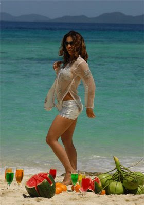 Indian Actress Kim Sharma in a white short skirt
