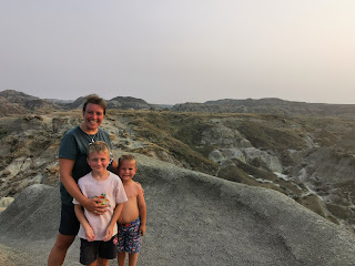 Family at sunset in Dinosaur Provincial Park