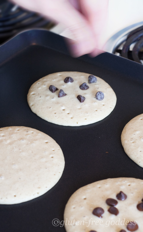 Gluten-free pancakes on the griddle.