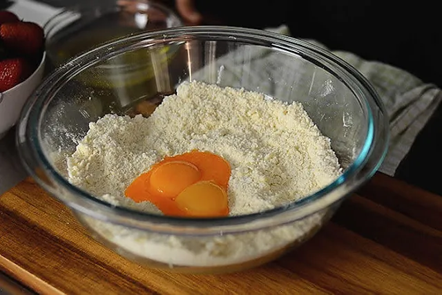 add egg yolk to Strawberry galette pastry