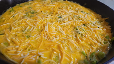 broccoli cheese frittata after adding the egg