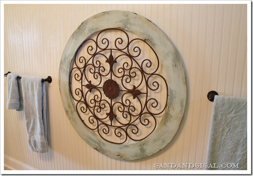 Garden medallion on bead board wall 