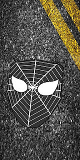 mary jane notices black symbiote mask laying on road