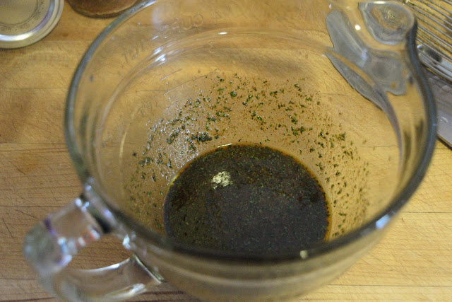 The marinade whisked together in the mixing bowl. 