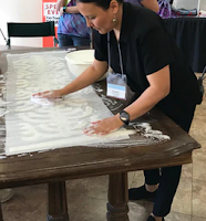 Artisan making a scarf