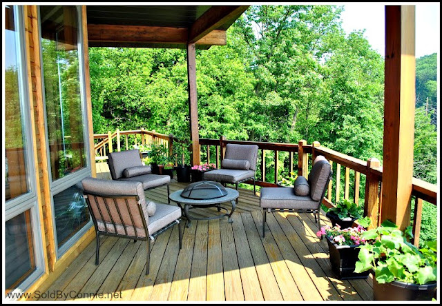 The gorgeous view of the lush scenery below this home for sale in the Fox Chapel area school district adds to its picture-perfect exterior. 