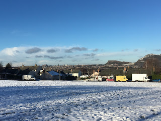 Edinburgh city view with snow in the foreground.