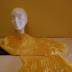 Bufanda de lana, tejida a mano, de color amarillo