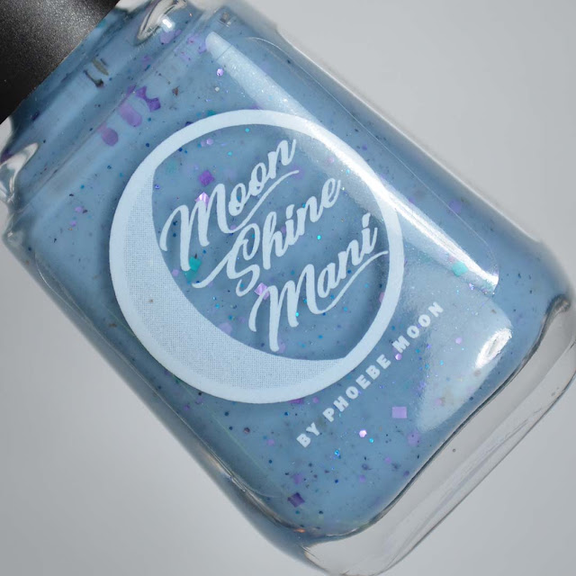 blue glitter nail polish in a bottle