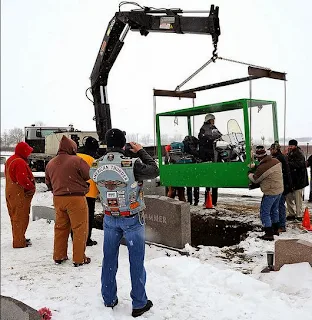 Man buried with his Harley Davidson.