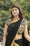 Sagarika glamorous photos in saree-thumbnail-12