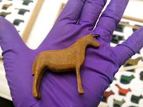 Image of a small wooden toy unicorn