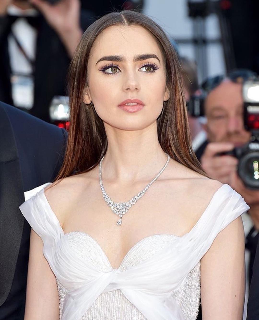 Lily Collins best red carpet dresses Instagram photos