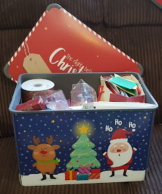 Christmas themed plastic storage boxes with lids ideal for Christmas decorations