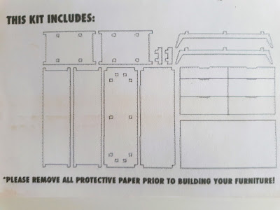 Kit instructions that state 'Please remove all protective paper prior to building your furniture'