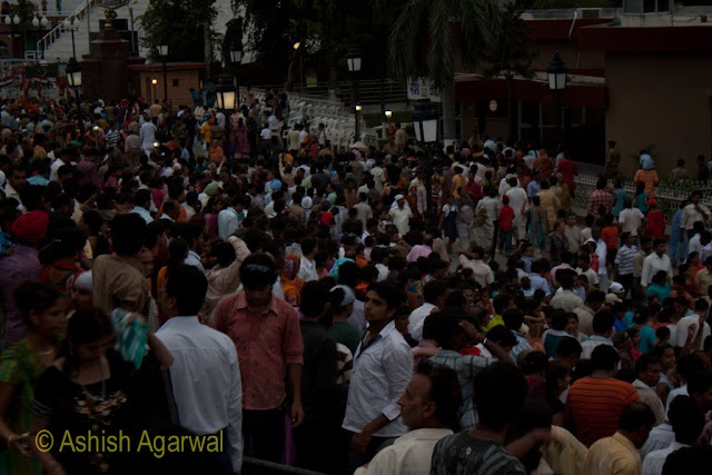 People all over the area after the end of the flag lowering ceremony at the Wagah border between India and Pakistan at sunset