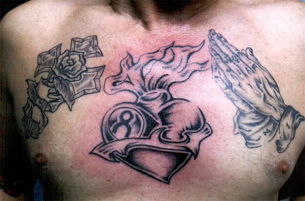 Cross Tattoos In Between Shoulder Blades. cross tattoos hand This