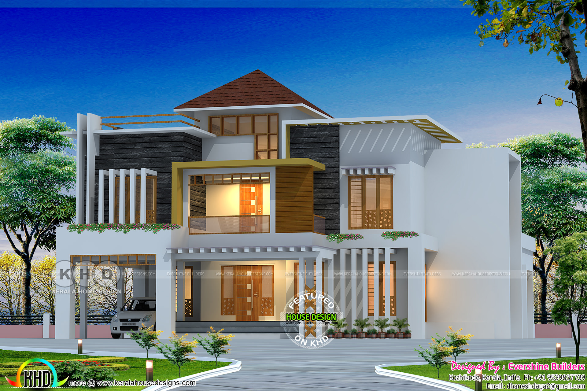 Mixed roof style ultra modern house in Kerala Kerala 