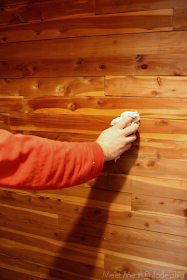 Wiping cedar walls in cedar closet via Meet Me in Philadelphia
