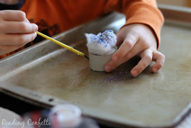 Kids can make and decorate pretend cupcakes to go along with the book If You Give a Cat a Cupcake by Laura Numeroff.