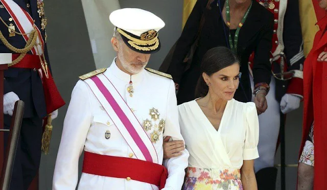 Queen letizia wore a new floral print midi skirt by Jose Hidalgo, and a white silk blouse Jose Hidalgo
