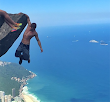 Man Is Hanging Off A Cliff But It's What His GirlFriend Is Doing That Got People Freaking Out (Photos)