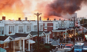 Row houses in Philadelphia burn after policed dropped a bomb on the Move house in May 1985. Photograph: AP