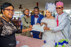 Okiki Afolayan and Abimbola Ogunnowo wedding photos