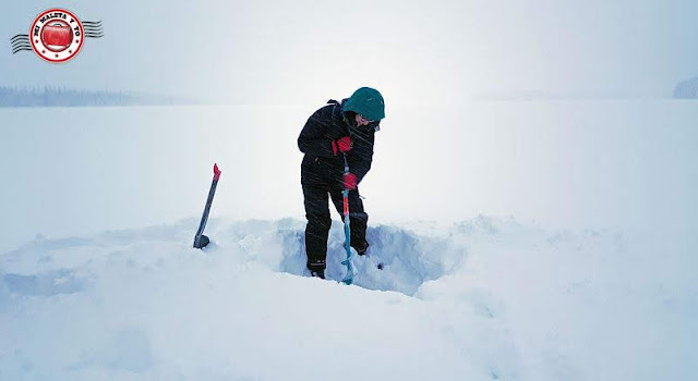 Pesca en hielo en Laponia, Finlandia