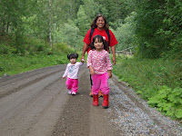 The girls taking a walk in the forrest