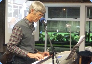 Linus Treefoot playing his keyboard and singing one of his original compositions. Photo courtesy of Dennis Lyons.
