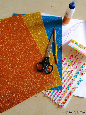 Things required to make glitter paper butterfly