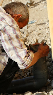 Putting a cap on the overflow pipe