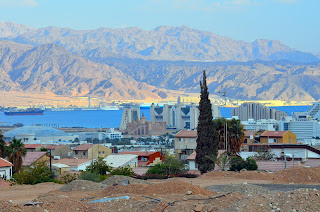 view of Eilat with Red Sea and Aqaba Jordan in background