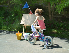 girl riding bike, bike wash, summertime fun, summer kids activities