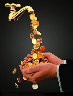 money flowing from tap into open palms