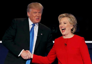 Donald Trump shakes hands with Hillary Clinton at the conclusion of their first presidential debate. 