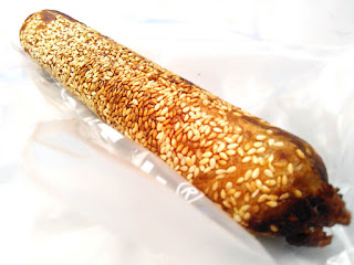 Sesame-coated red bean bread stick.