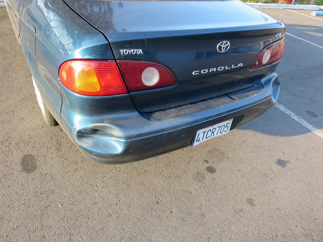 Huge dent in bumper before auto body repairs at Almost Everything Auto Body