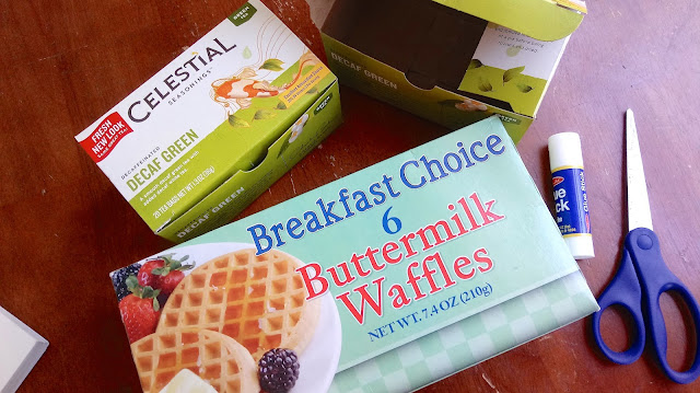 two empty tea boxes and a waffle box for making Mini Easter Treat Baskets