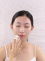 Dab the cushion foundation in a press and roll motion.